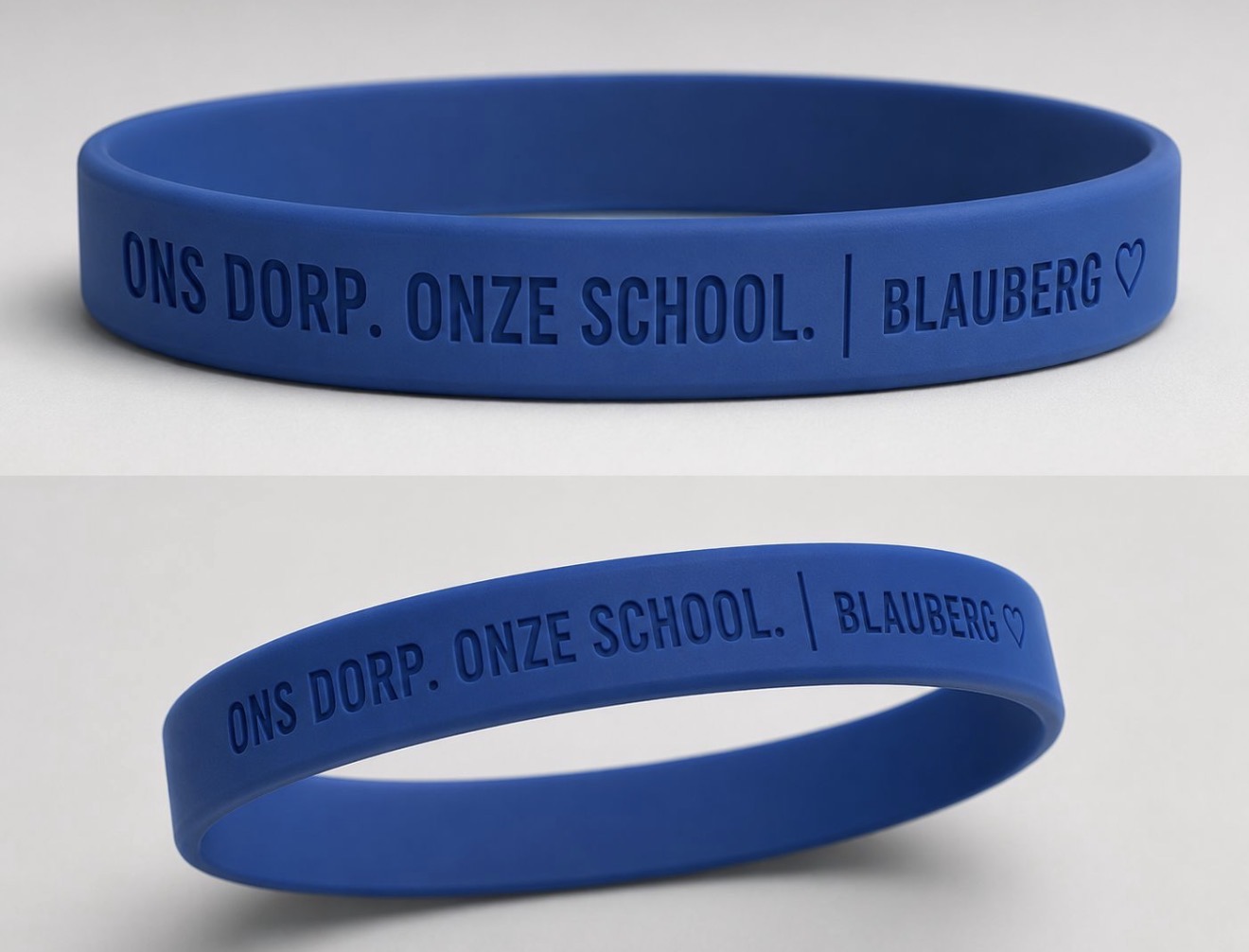 Blauw Hart voor Blauberg polsbandje met de tekst Ons dorp. Onze school. Blauberg